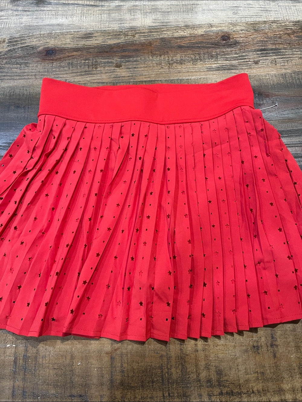 Thrive Red Pleated Mini Skirt with Star Cutout